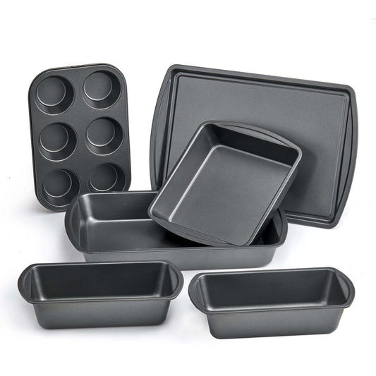 Set of gray baking pans including loaf pans, a square pan, and a muffin tray.